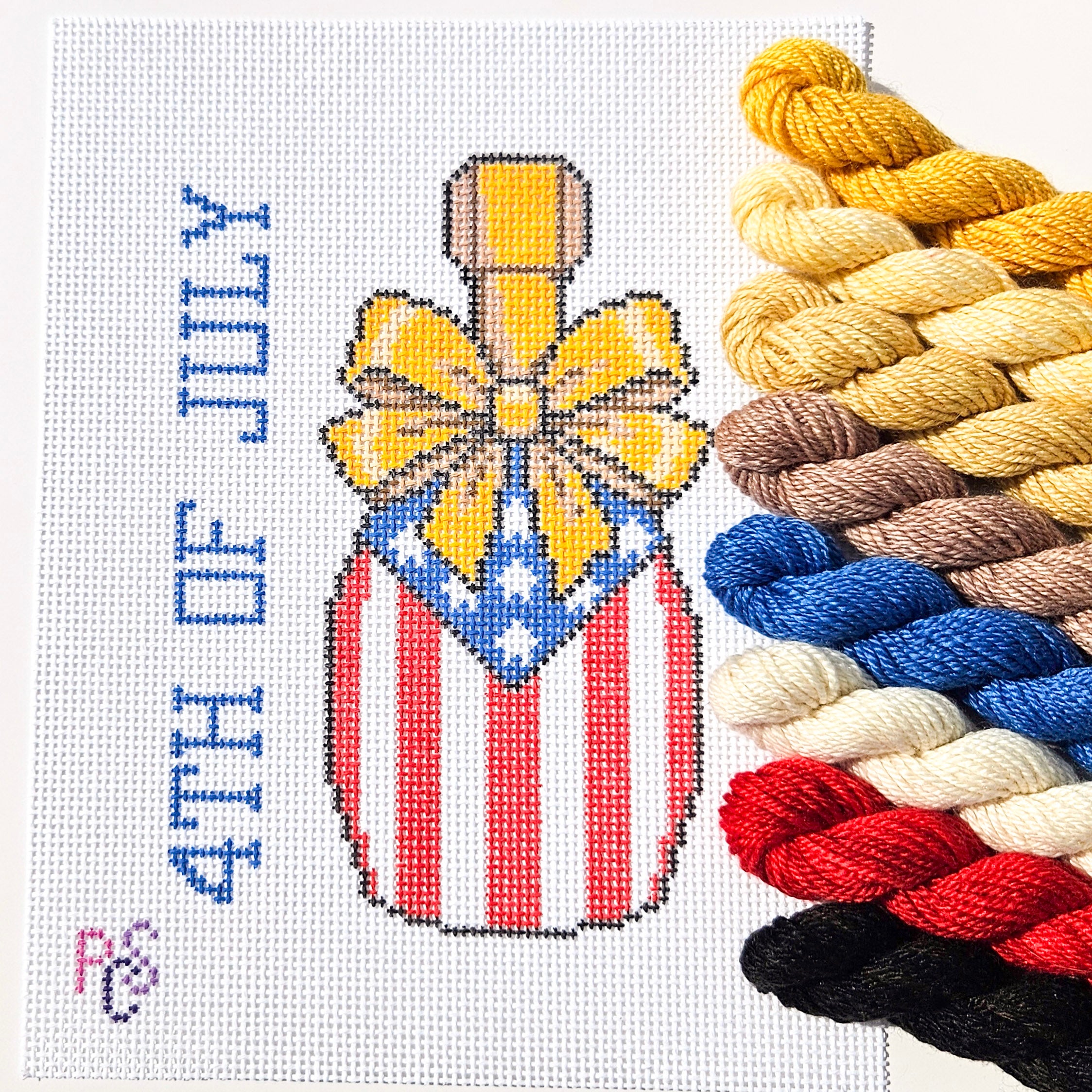hand-painted 4th of July celebration needlepoint canvas featuring patriotic red white and blue Americana design on 13 Count Zweigart Mono Deluxe Canvas Dinky Dyes