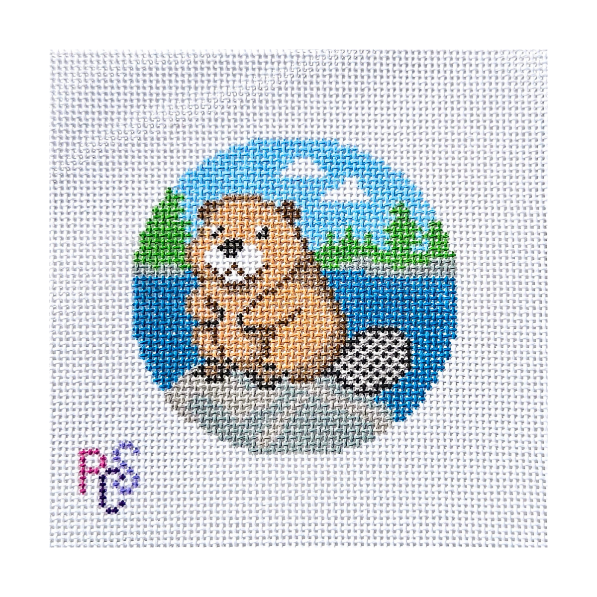 Beaver by the Lake hand-painted needlepoint canvas featuring a Canadian beaver beside a blue lake and evergreen trees