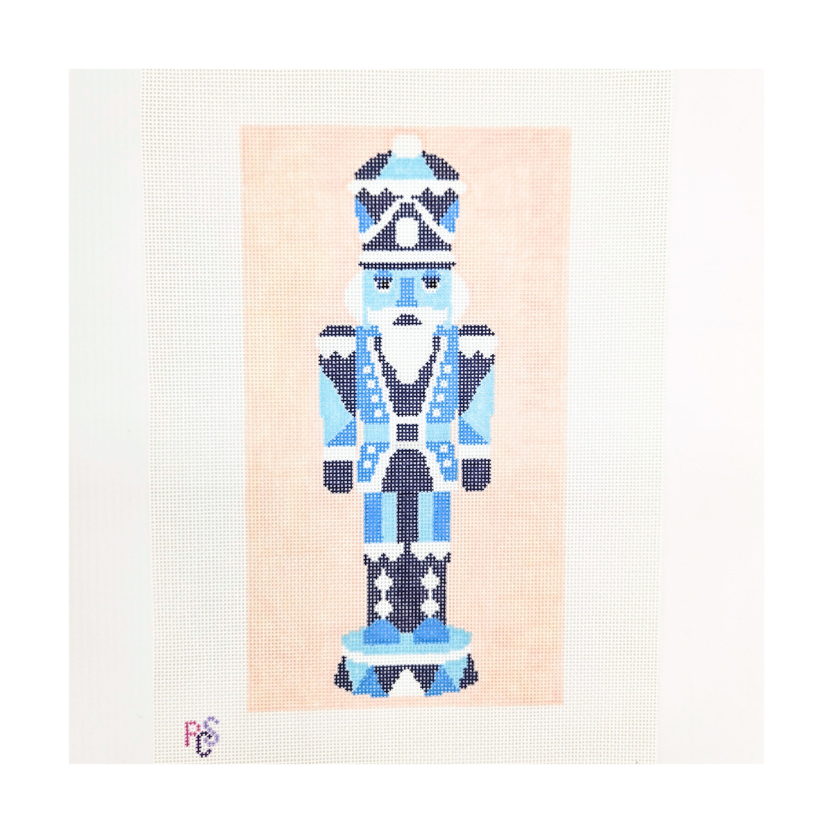 Blue Christmas hand-painted needlepoint canvas featuring a traditional nutcracker in navy, blue, aqua and white on 18 count Zweigart canvas