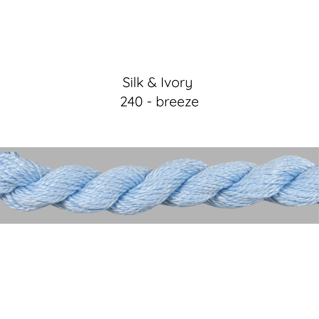 Light blue yarn with 'Silk & Ivory 240 - breeze' text on a white background