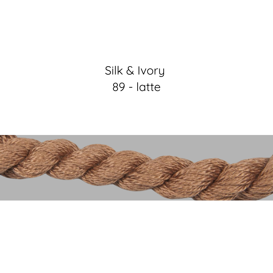 Close-up of braided yarn with 'Silk & Ivory 89 - latte' text on a gray background