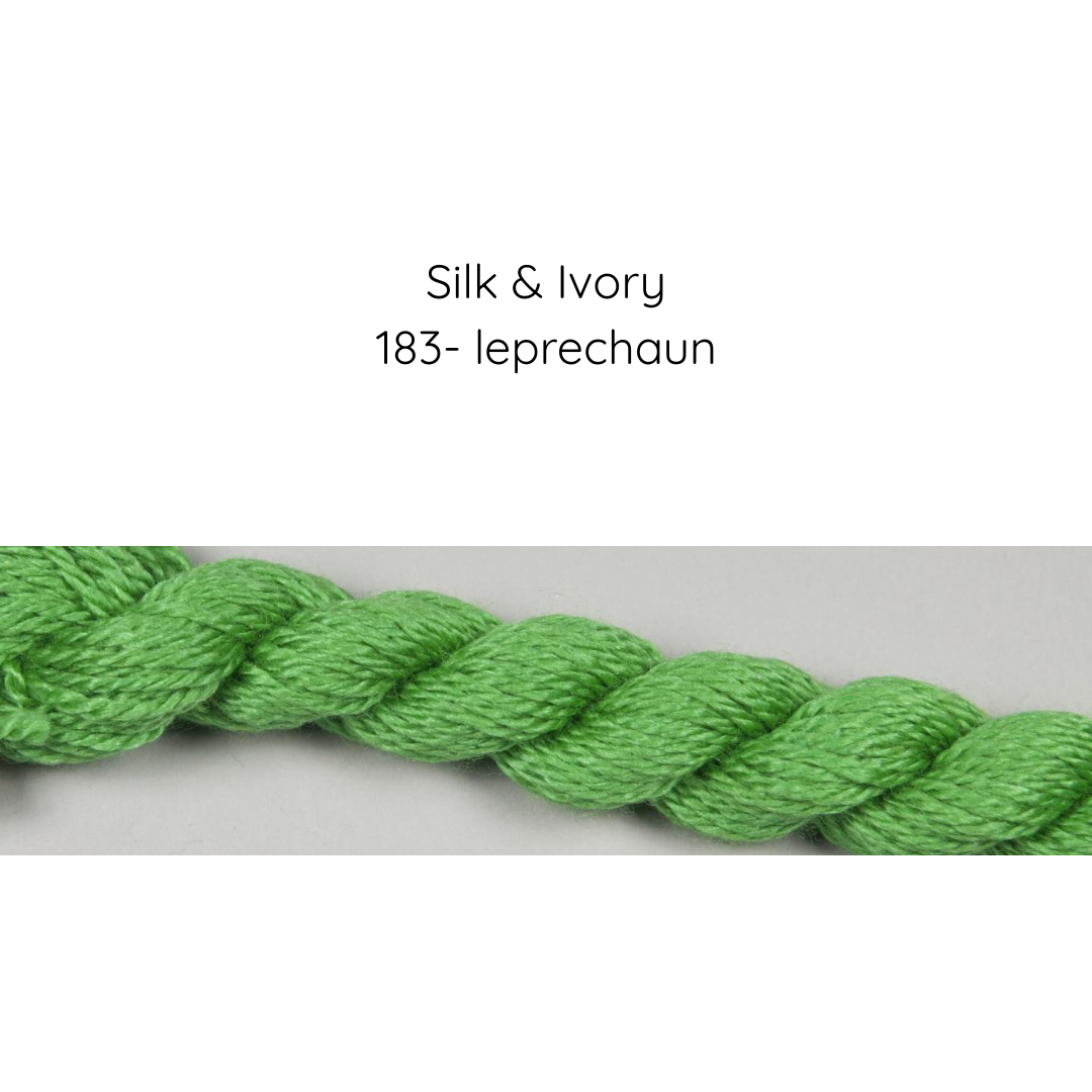 Close-up of green yarn labeled 'Silk & Ivory 183- leprechaun' on a white background
