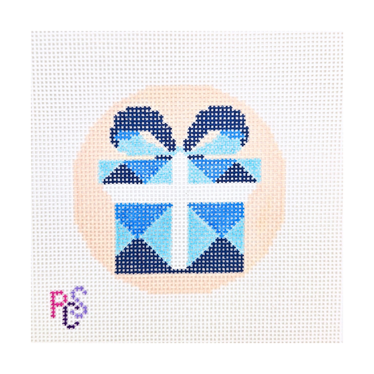 Blue Christmas Gift needlepoint canvas featuring a geometric blue Christmas present with a large bow and white ribbon on a peach circular background