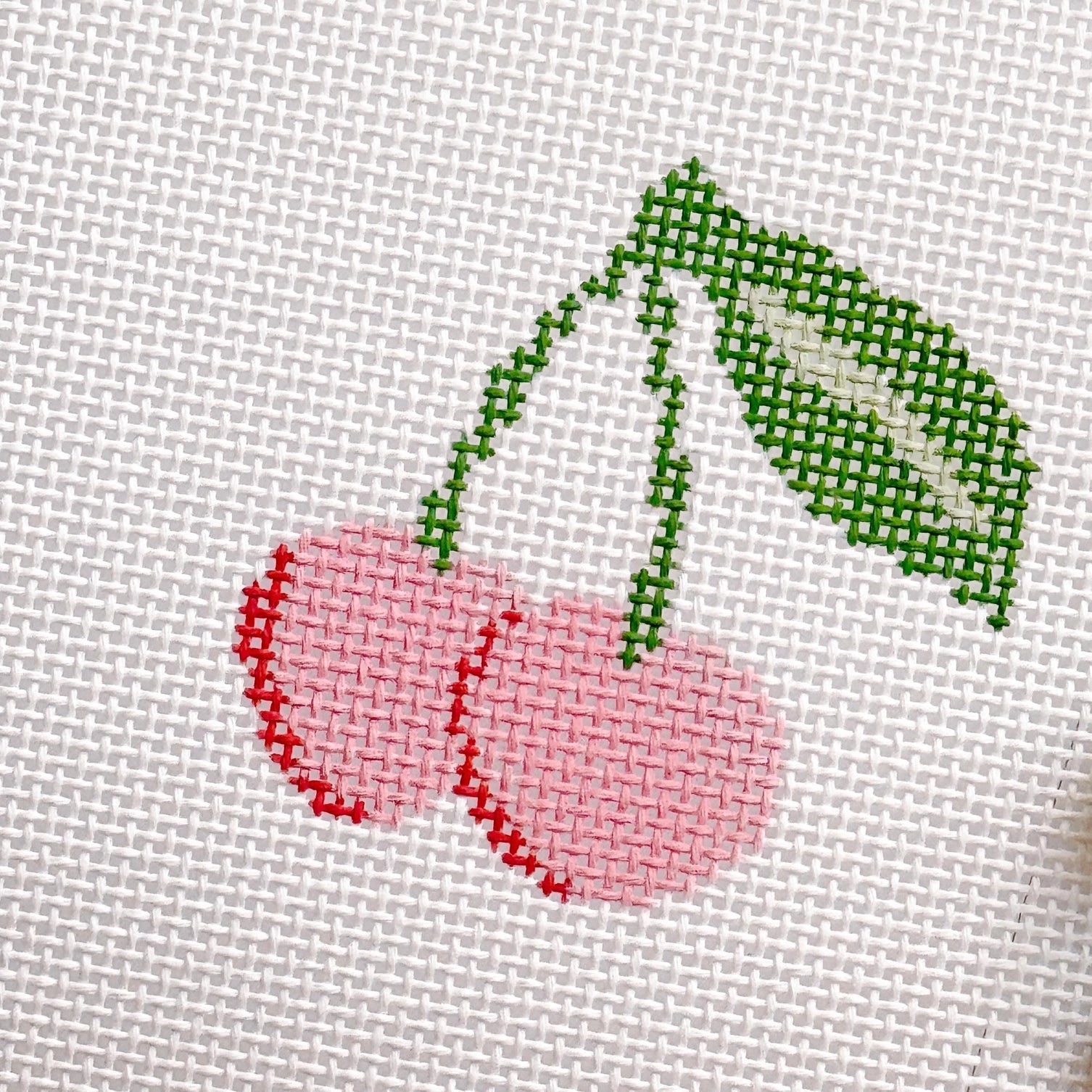 Needlepoint cherry design on fabric