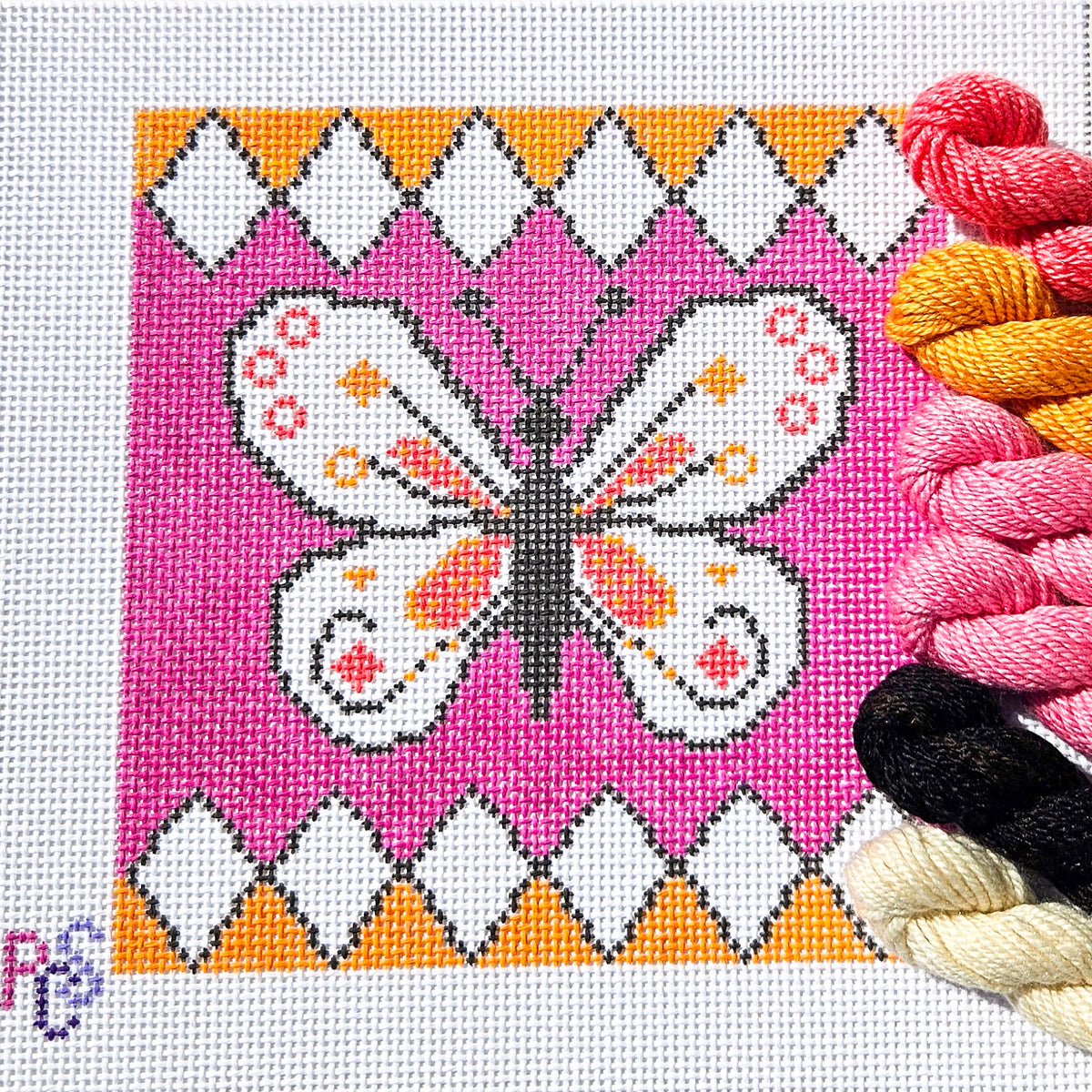 Diamond Butterfly needlepoint kit featuring a colourful butterfly with floral details and diamond-inspired geometric border