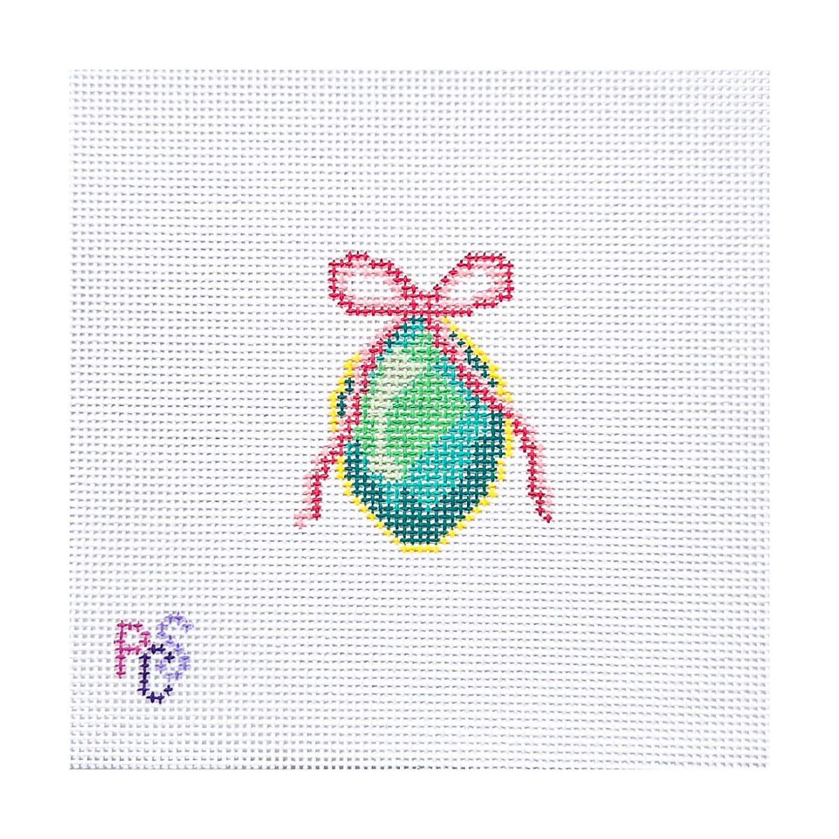 Emerald Jewel with Pink Bow hand-painted needlepoint canvas featuring a faceted green gemstone with pink bow and gold accents