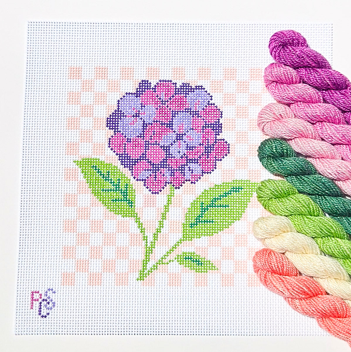 hand-painted hydrangea needlepoint canvas featuring pink and purple hydrangea flowers on a soft pink gingham background on 13 Count Zweigart Mono Deluxe Canvas Dinky Dyes