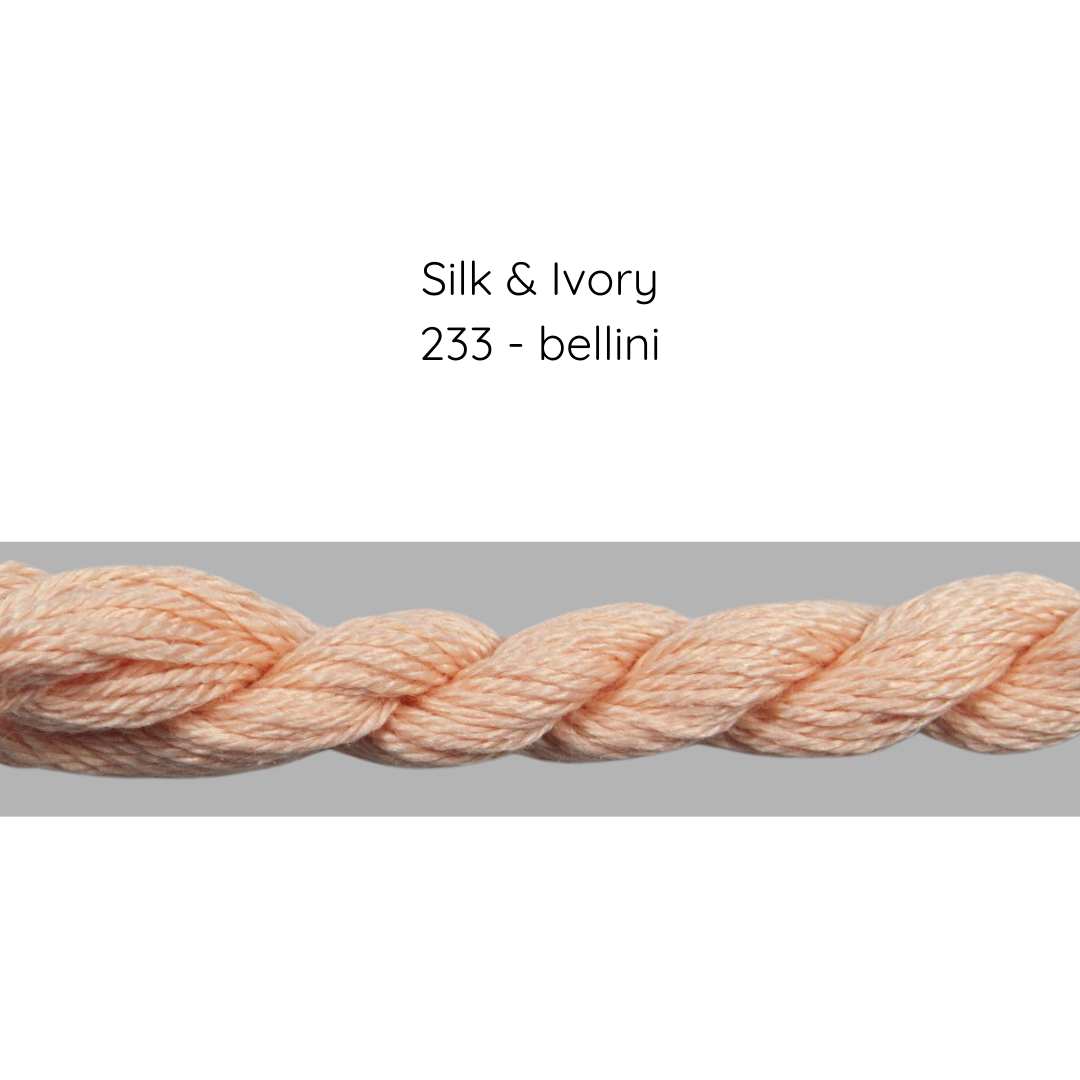 Braided silk thread labeled 'Silk & Ivory 233 - bellini' on a gray background