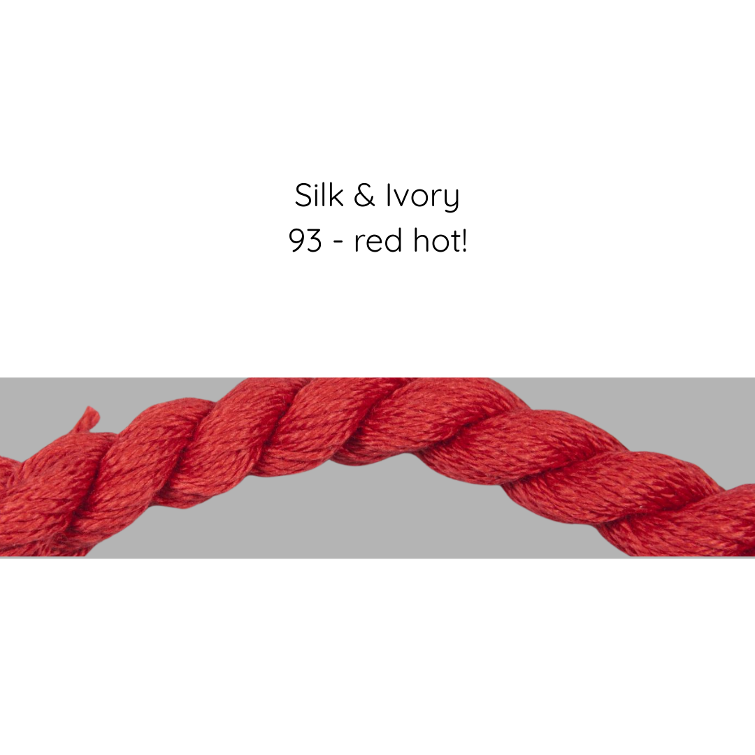Close-up of red yarn with 'Silk & Ivory 93 - red hot!' text on a gray background