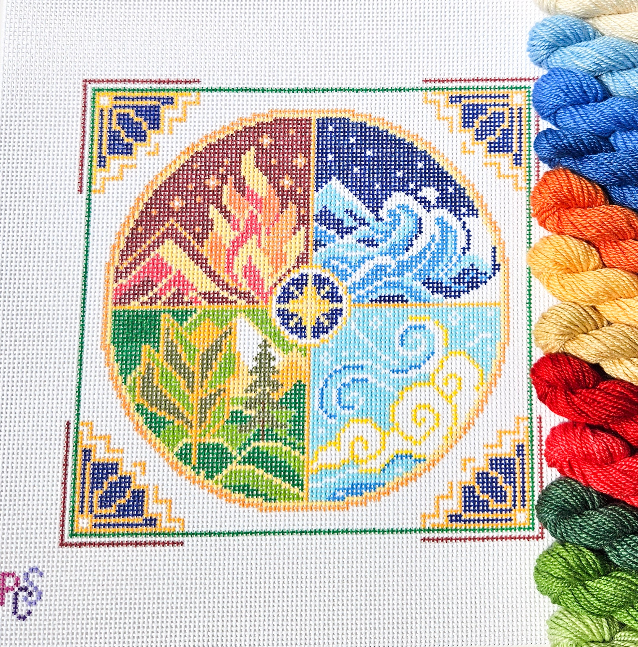 Hand-painted The Four Elements Needlepoint Kit on 13 Count Zweigart Mono Deluxe Canvas featuring symbolic fire, water, earth, and air arranged in a colorful circular geometric design Dinky Dyes